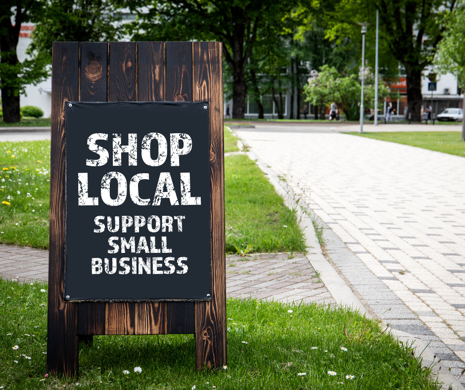 Sign that says Shop Local, support small business